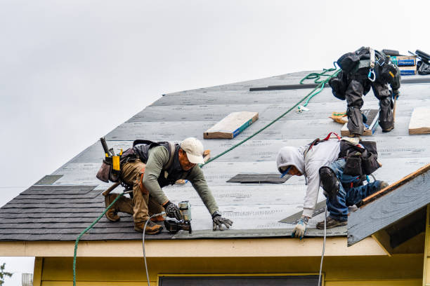 Professional Roof Replacement technician working in Pomona, NY